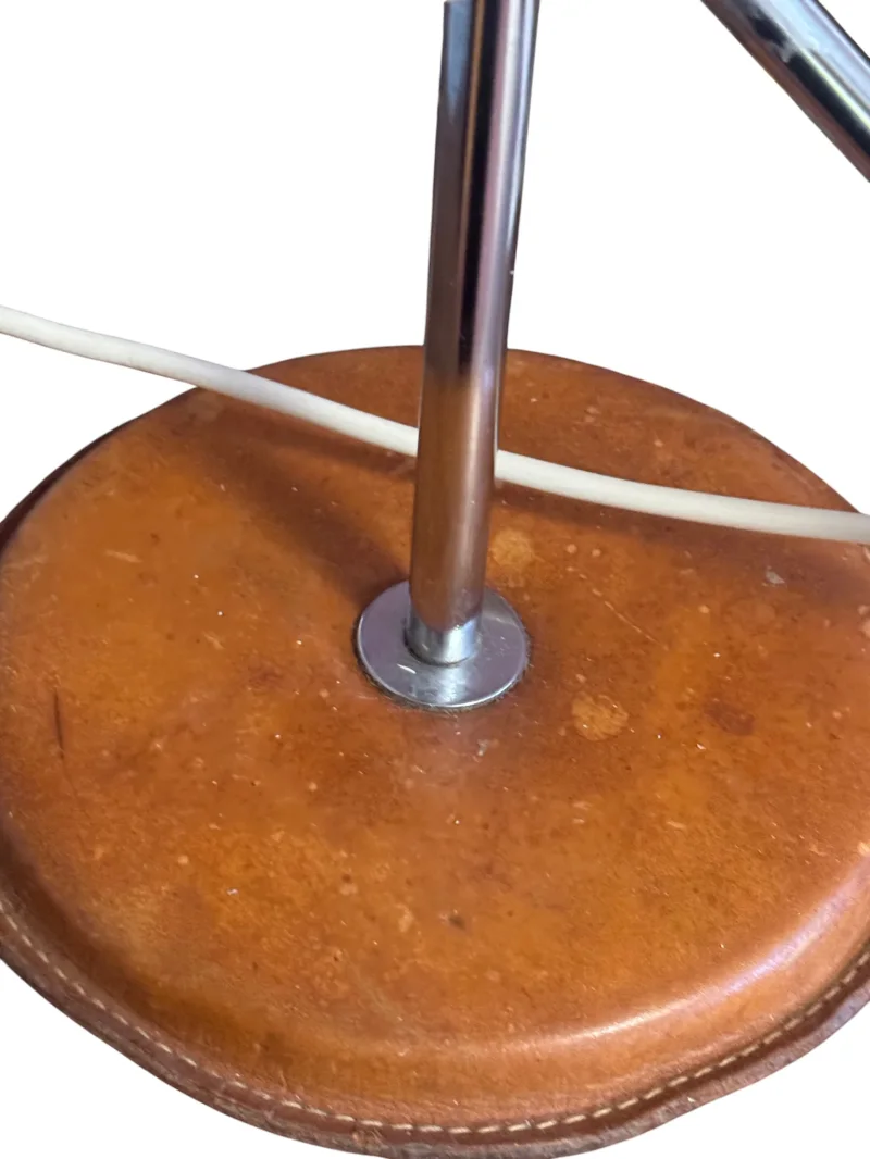 Close-up of leather-wrapped base and cord grommet on Simris table lamp by Anders Pehrson for Atelje Lyktan