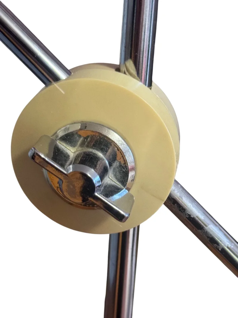 Close-up of chromed sliding rods and ivory adjustment knob on Simris table lamp by Atelje Lyktan