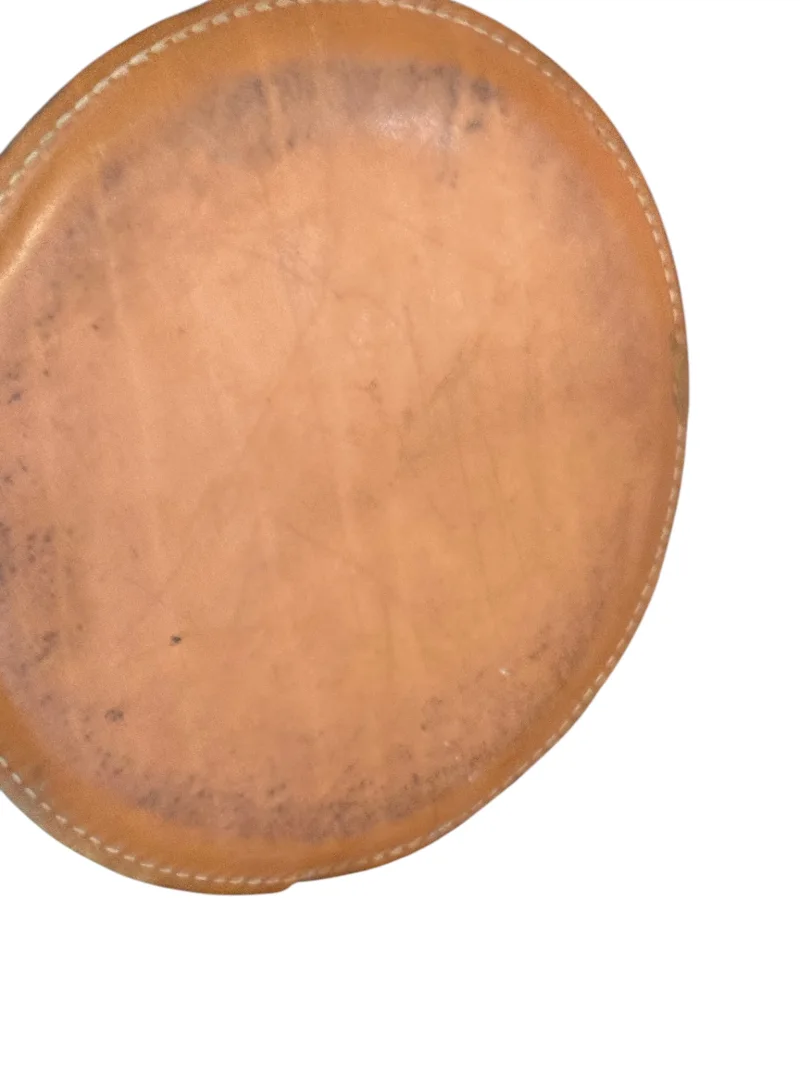 Underside view of patinated leather base on vintage Simris table lamp by Atelje Lyktan