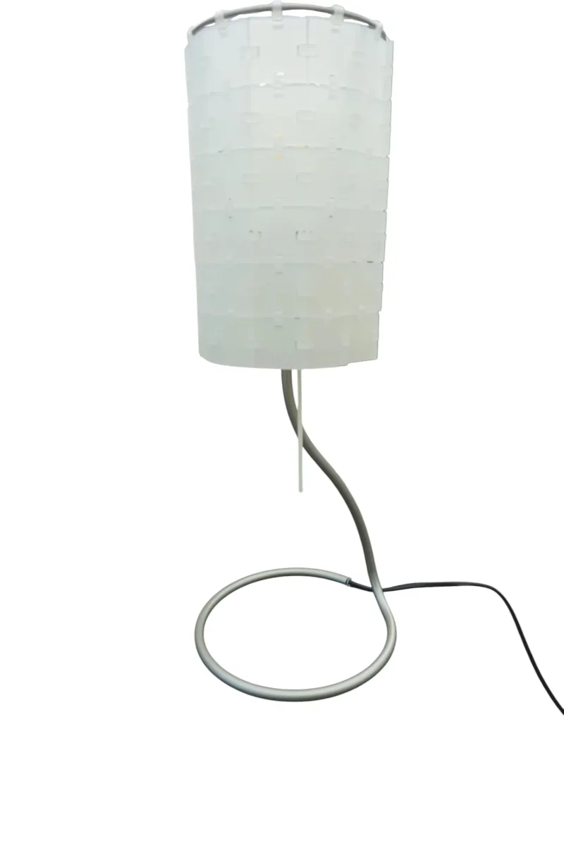 Flos Bloc T table lamp switched off, white shade of polycarbonate modules on a curved tubular metal base