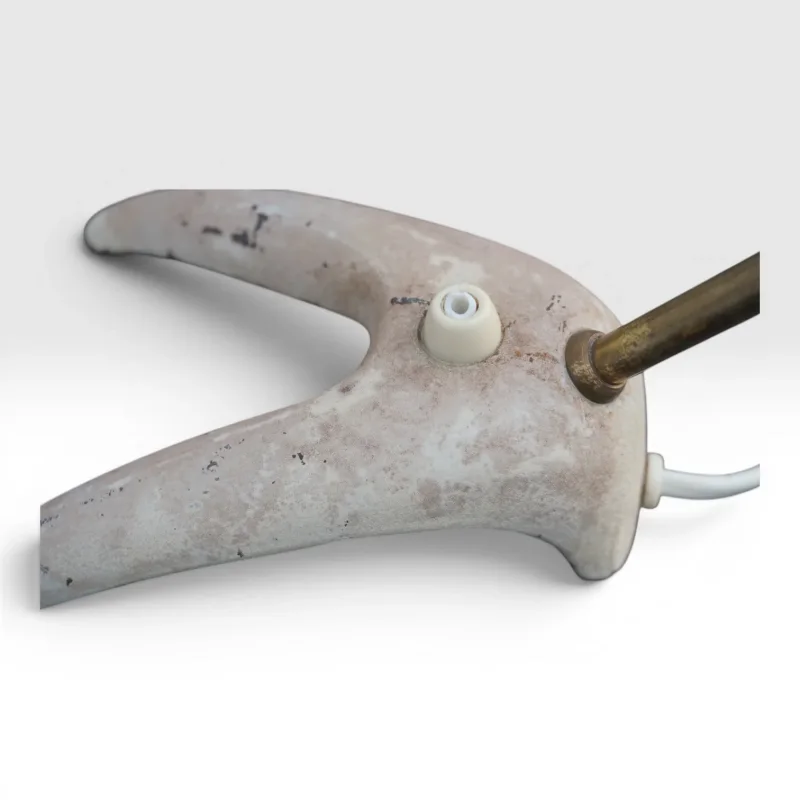 Detail of EWA Värnamo B52 Crow Foot cast metal base with rotary switch and brass tube fitting, Sweden 1950s