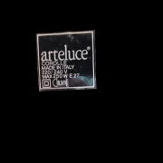 Original Arteluce Corolle label on base: brand name, model, Made in Italy, 220-240V, max 250W, E27 socket