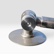 Close-up of the chrome ball-joint swivel mechanism on the round base of the Hala Zeist model 144 desk lamp