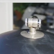 Close-up of the chrome locking knob and joint on the adjustable arm of the Hala Zeist model 144 desk lamp