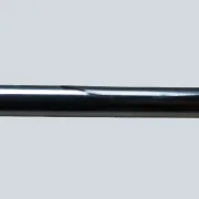 Detail view of the polished chrome rod on a Cosack 4166 wall light, showing surface texture and a minor dent