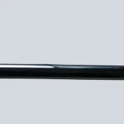 Close-up of the chrome tube on the Cosack 4166 wall sconce, highlighting the reflective finish and a small dent