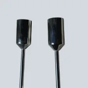 Close-up comparison of the chrome end caps on a pair of Cosack 4166 wall sconces