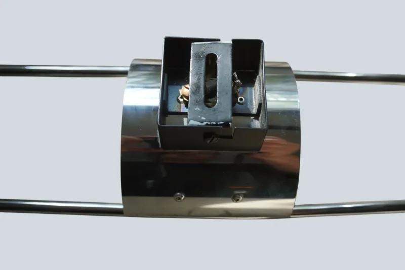 Rear view of the chrome mounting bracket and black wiring box on a Cosack model 4166 wall sconce