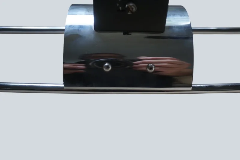 Angled view of the chrome mounting housing and wiring compartment on a Cosack model 4166 wall sconce