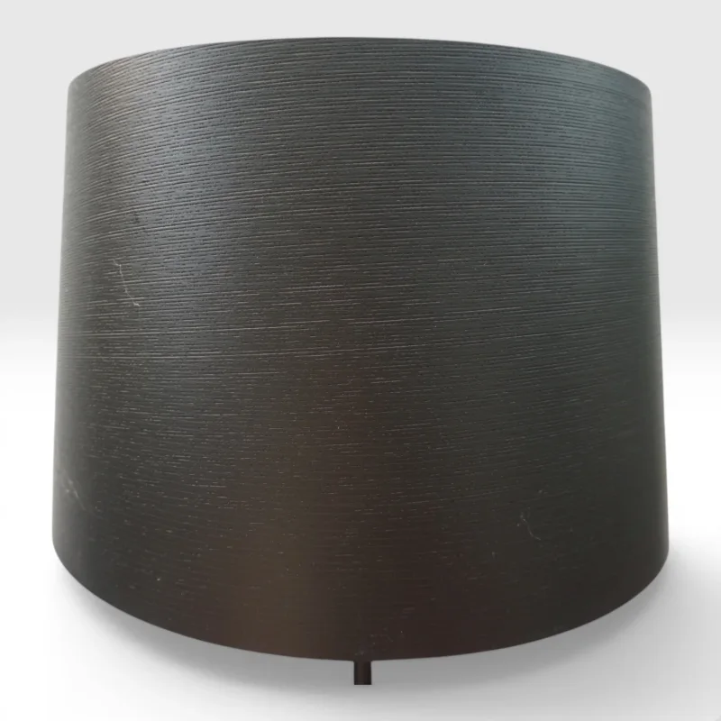 Close-up of the large cylindrical ribbed textile shade of the Foscarini Twiggy Tavolo XL in black