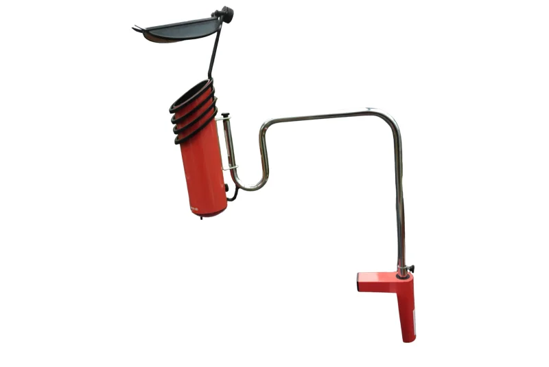 Ateljé Lyktan Skarabé salmon and chrome clamp lamp, angled view showing chrome Z-arm and cylindrical head with black rings