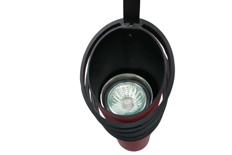 Ateljé Lyktan Skarabé interior of salmon lamp head showing GU10 halogen socket and reflector mechanism, detail view