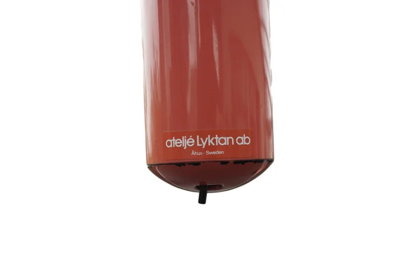 Original ateljé Lyktan ab Åhus Sweden manufacturer label on salmon Skarabé clamp lamp cylinder, fully intact