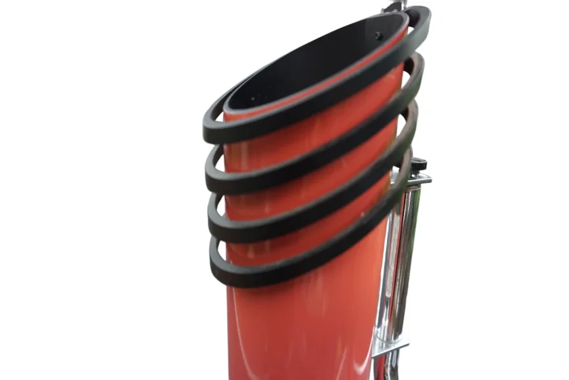 Ateljé Lyktan Skarabé black ribbed rings on salmon cylinder, alternate close-up showing surface texture and lacquer quality